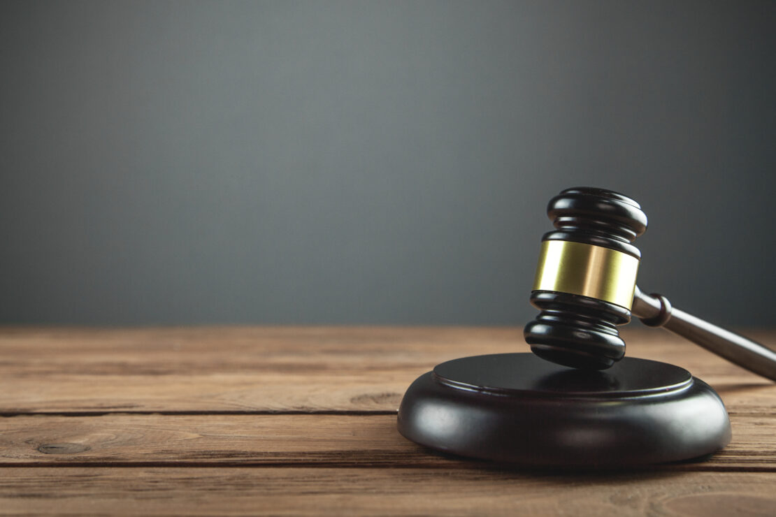 Judge Gavel on a wooden desk. Law concept